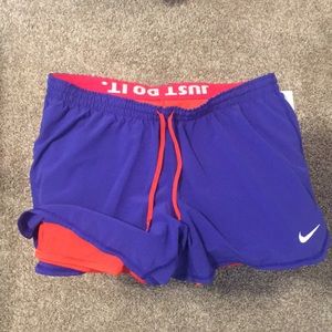 Women’s size medium purple Nike running shorts